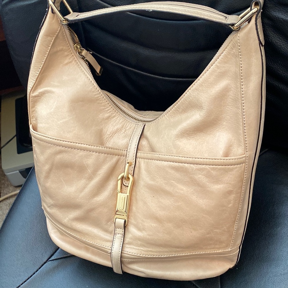Handbag. Tan color  14” high/15 1/2” wide Calvin Klein. Top zipper.